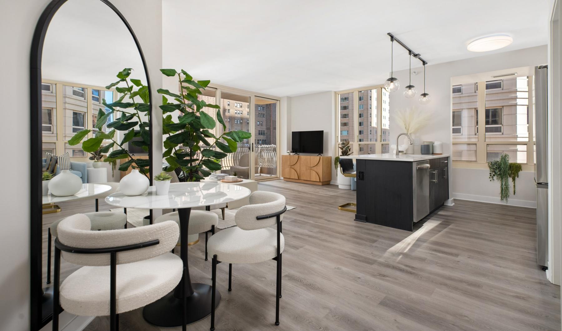 The essence of exceptional living a room with a table and chairs